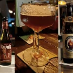 Copa de la Kwak en su soporte, cáliz de La Trappe y vaso de trigo, con la cerveza servida